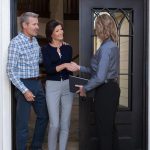 a couple meeting with a window consultation professional