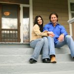 happy people sitting on a staircase